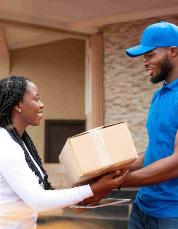 close-up-delivery-person-giving-parcel-client small